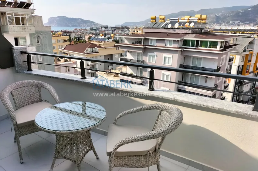 Purchase 1+1 penthouse with sea and mountain views in Alanya Tosmur B21 district 12
