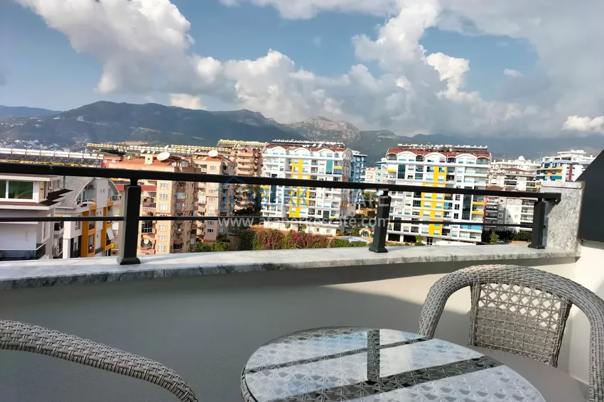 Purchase 1+1 penthouse with sea and mountain views in Alanya Tosmur B21 district 14