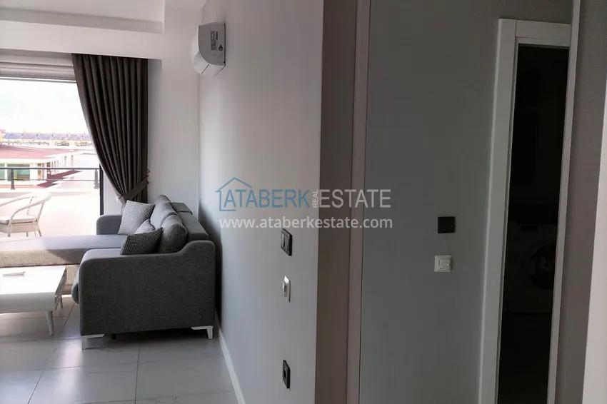 Purchase 1+1 penthouse with sea and mountain views in Alanya Tosmur B21 district 15