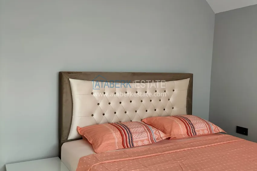 Purchase 1+1 penthouse with sea and mountain views in Alanya Tosmur B21 district 17