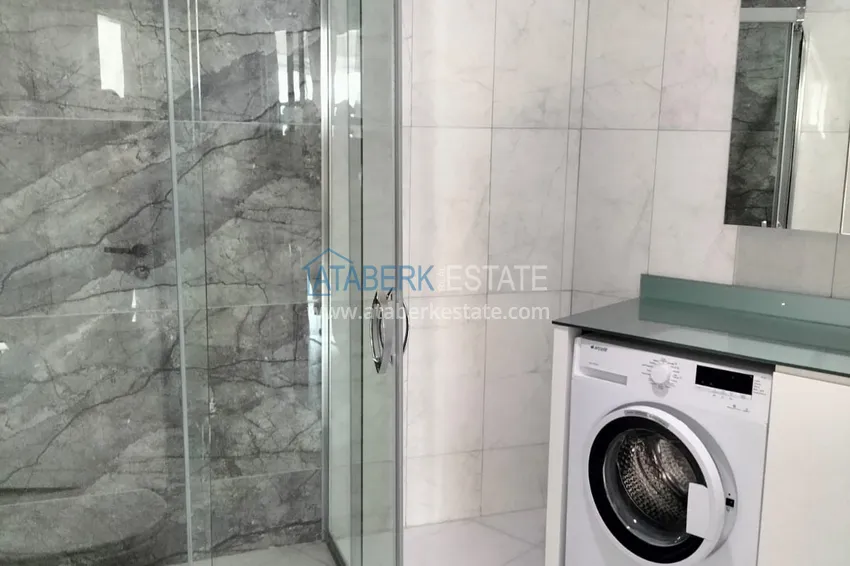 Purchase 1+1 penthouse with sea and mountain views in Alanya Tosmur B21 district 18