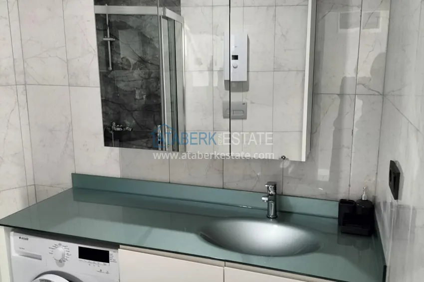 Purchase 1+1 penthouse with sea and mountain views in Alanya Tosmur B21 district 19