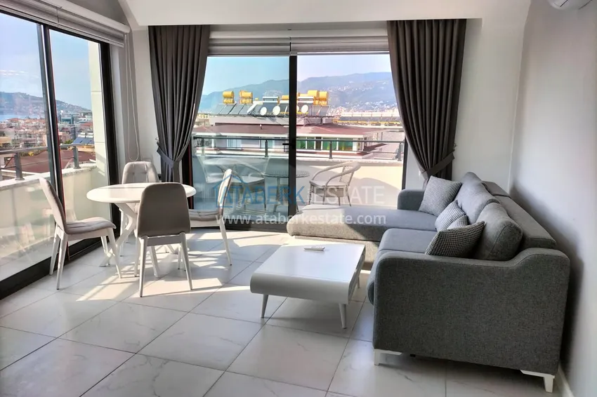 Purchase 1+1 penthouse with sea and mountain views in Alanya Tosmur B21 district 2