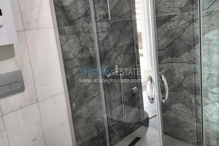 Purchase 1+1 penthouse with sea and mountain views in Alanya Tosmur B21 district 21