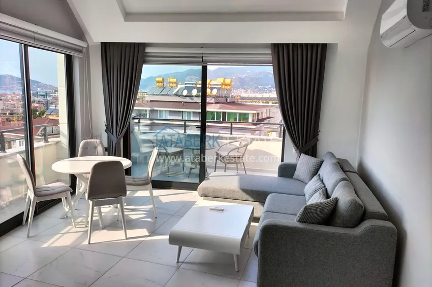 Purchase 1+1 penthouse with sea and mountain views in Alanya Tosmur B21 district 3