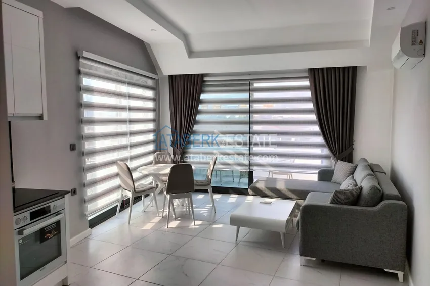 Purchase 1+1 penthouse with sea and mountain views in Alanya Tosmur B21 district 4