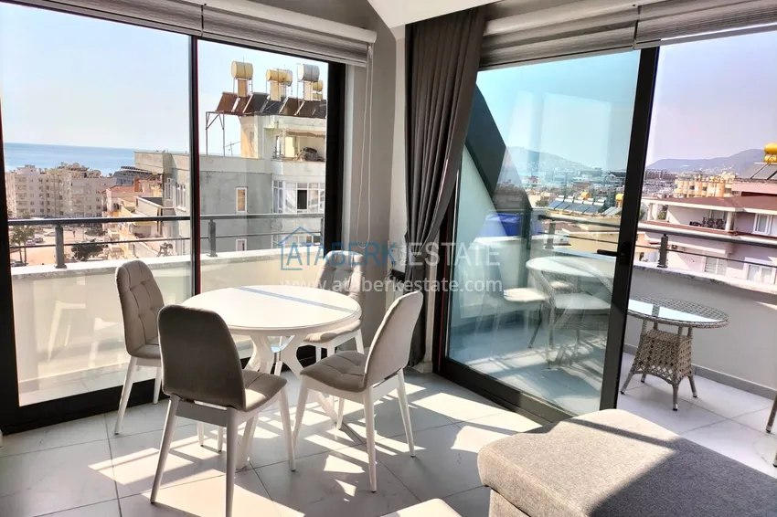 Purchase 1+1 penthouse with sea and mountain views in Alanya Tosmur B21 district 8
