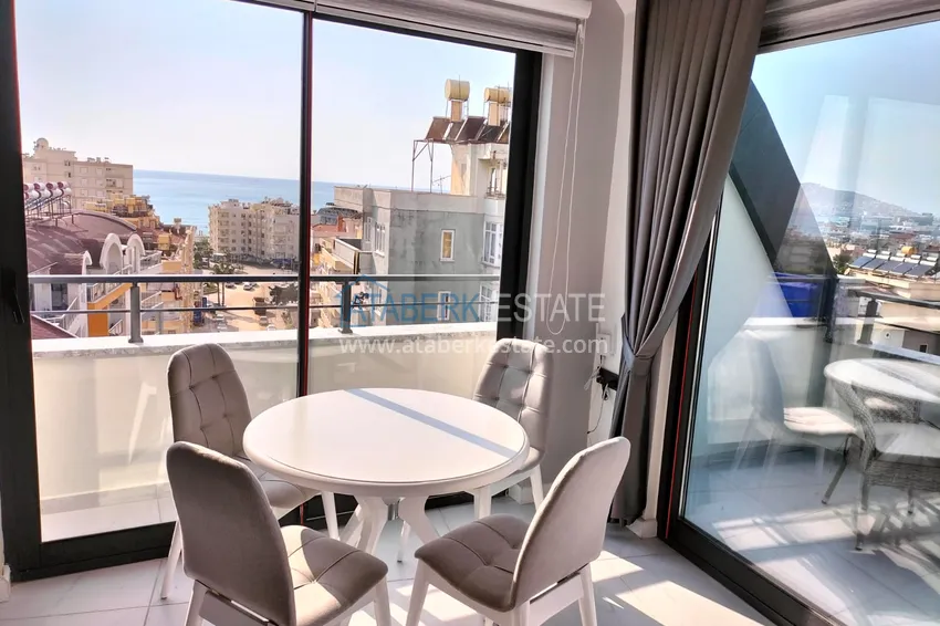 Purchase 1+1 penthouse with sea and mountain views in Alanya Tosmur B21 district 9