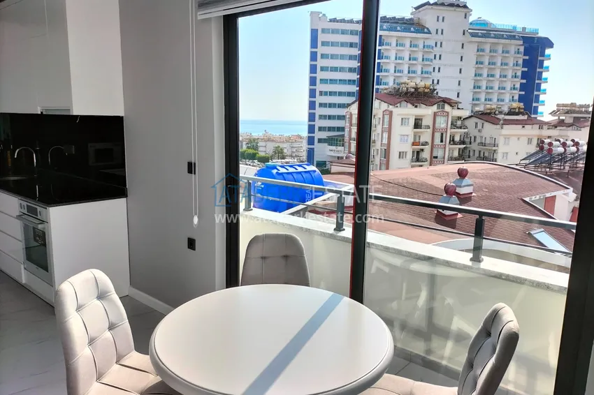 Purchase 1+1 penthouse with sea and mountain views in Alanya Tosmur B21 district 10