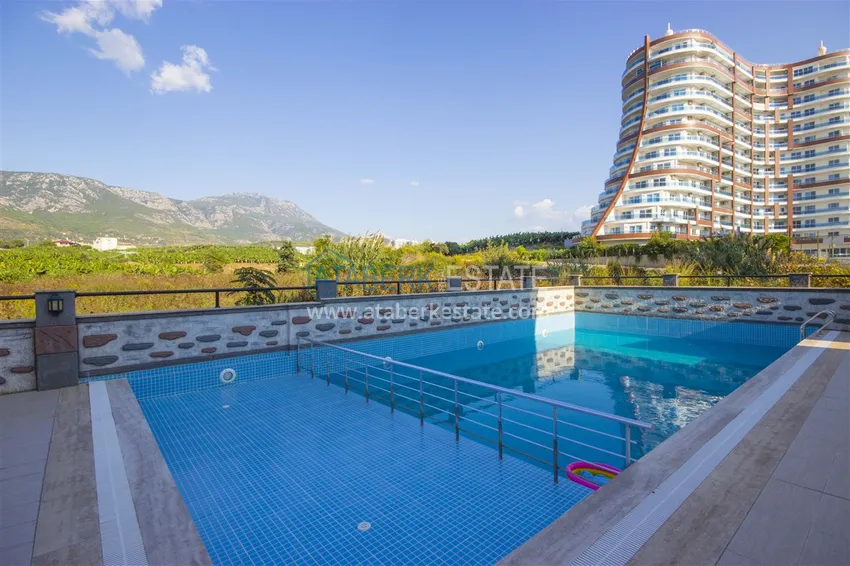 Furnished apartment in Mahmutlar with mountain views and partly sea views 1 