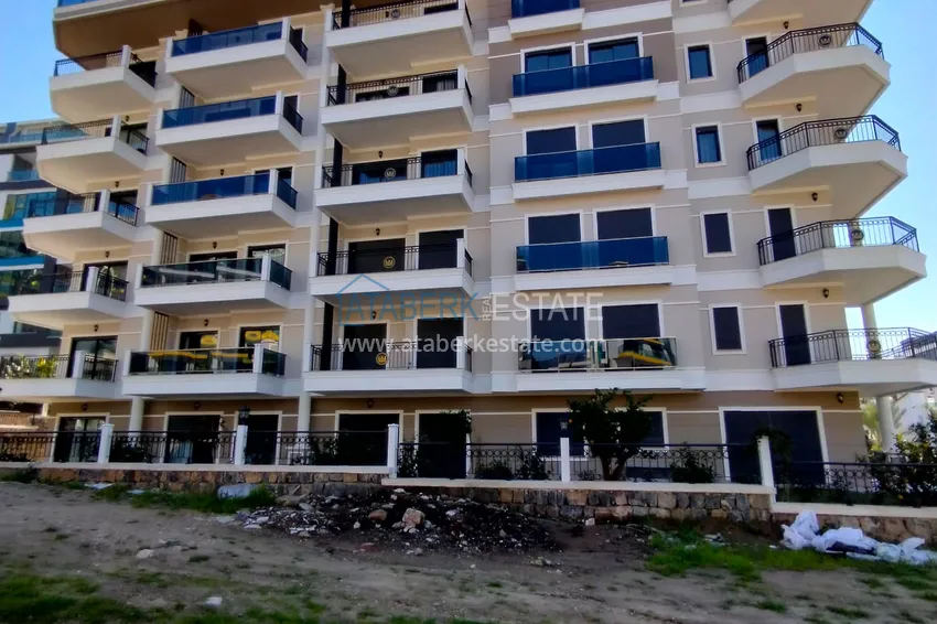 2+1 apartment with high-quality finishing and open sea views in an exclusive complex — Alanya, Kargicak 13 