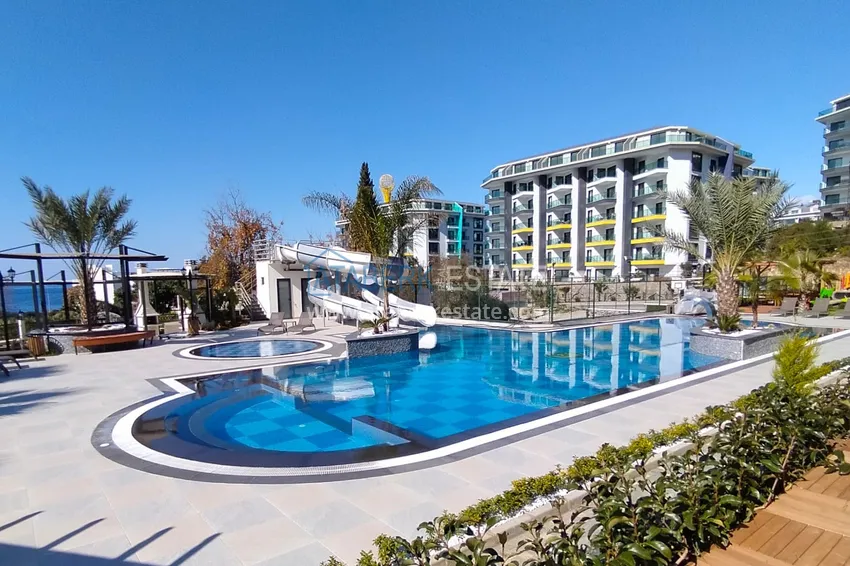 2+1 apartment with high-quality finishing and open sea views in an exclusive complex — Alanya, Kargicak 2 