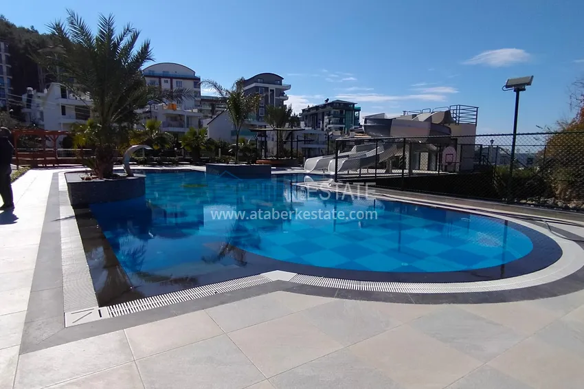 2+1 apartment with high-quality finishing and open sea views in an exclusive complex — Alanya, Kargicak 9 