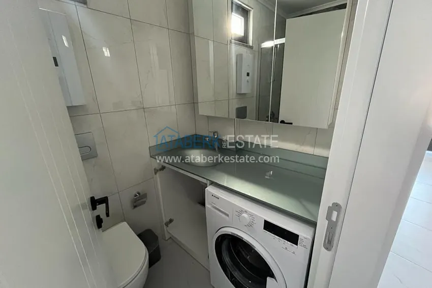 Kupuj Jednopokojowe mieszkanie do wynajęcia zaledwie 300 metrów od morza — Tosmur, Alanya nr 16 9