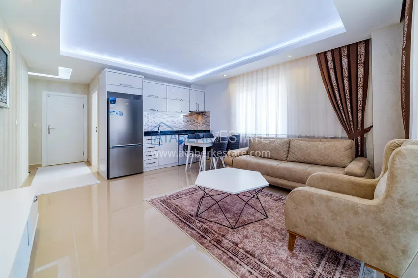 Purchase One bedroom apartment in Mahmutlar furnished with open sea views 1