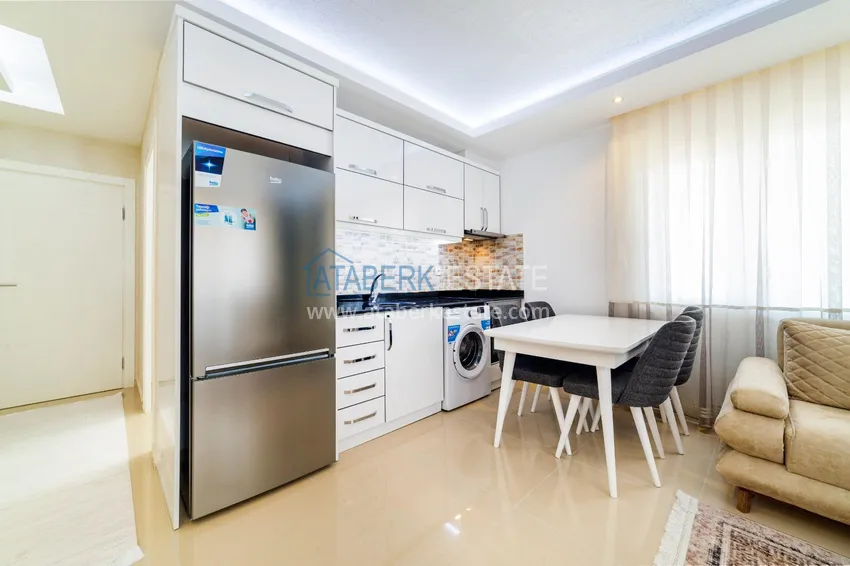 Purchase One bedroom apartment in Mahmutlar furnished with open sea views 3