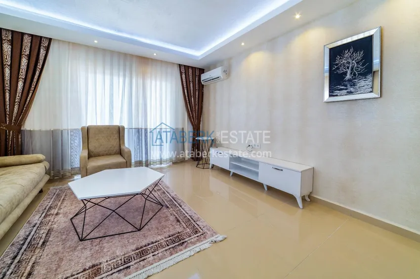 Purchase One bedroom apartment in Mahmutlar furnished with open sea views 4
