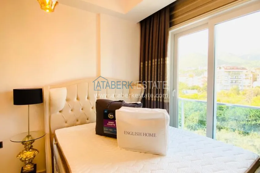 Purchase Newly furnished apartment with a glazed balcony in a modern complex - Oba district, Alanya 12