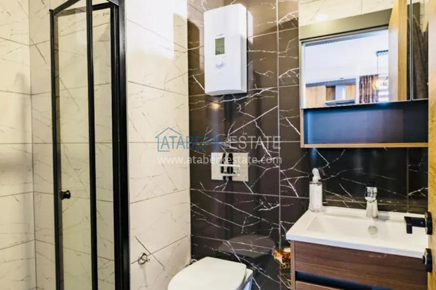 Purchase Newly furnished apartment with a glazed balcony in a modern complex - Oba district, Alanya 13