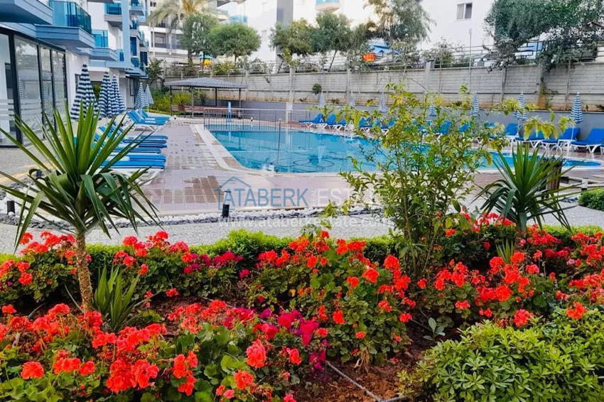 Newly furnished apartment with a glazed balcony in a modern complex - Oba district, Alanya 1