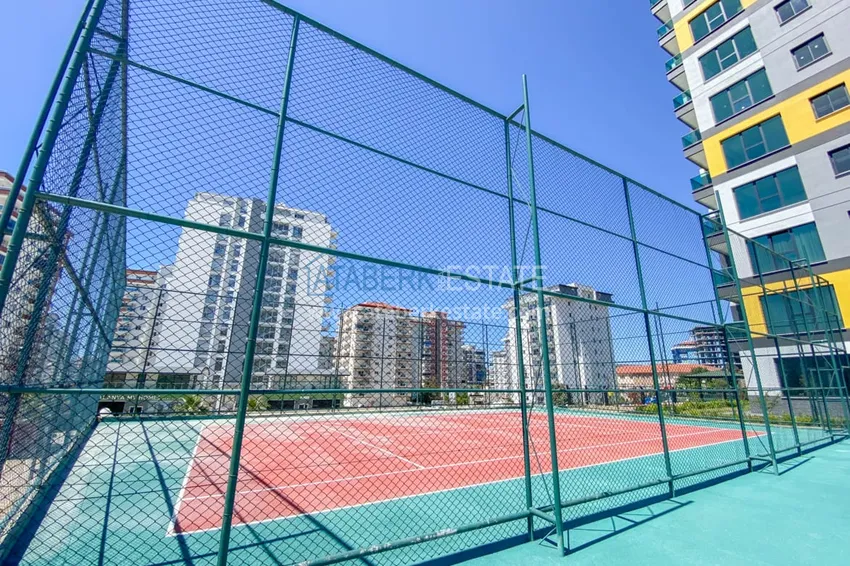 Furnished apartment in Mahmutlar, in a young residential complex 10