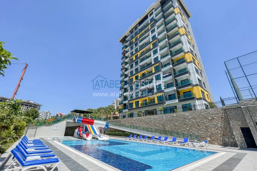 Furnished apartment in Mahmutlar, in a young residential complex 1