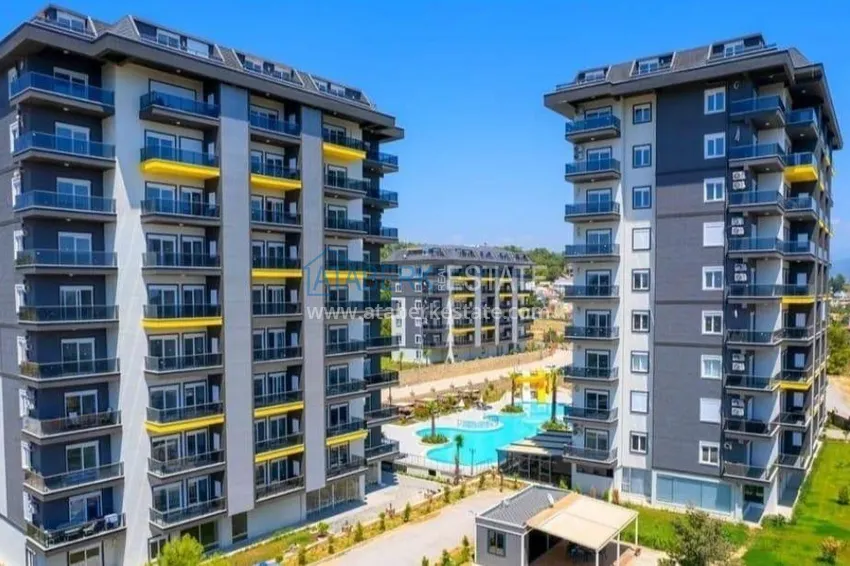 Apartament pod klucz z 1 sypialnią i przeszklonym balkonem w Alanya w dzielnicy Avsallar. Dostępna jest rata 1