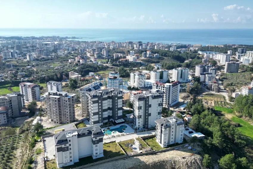 Apartament pod klucz z 1 sypialnią i przeszklonym balkonem w Alanya w dzielnicy Avsallar. Dostępna jest rata 2