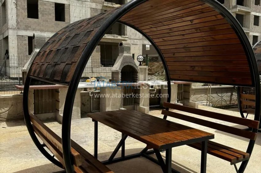 One bedroom apartment with separate kitchen and side sea view in Mersin, Tomyuk district 14