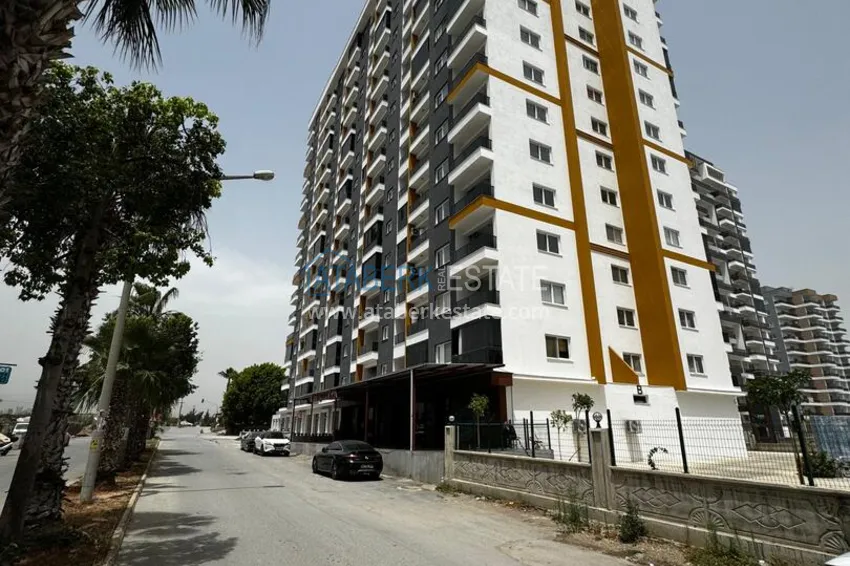 One bedroom apartment with separate kitchen and side sea view in Mersin, Tomyuk district 1