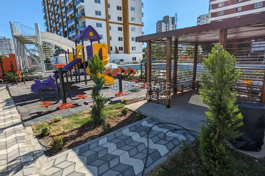 One bedroom apartment with separate kitchen and side sea view in Mersin, Tomyuk district 8