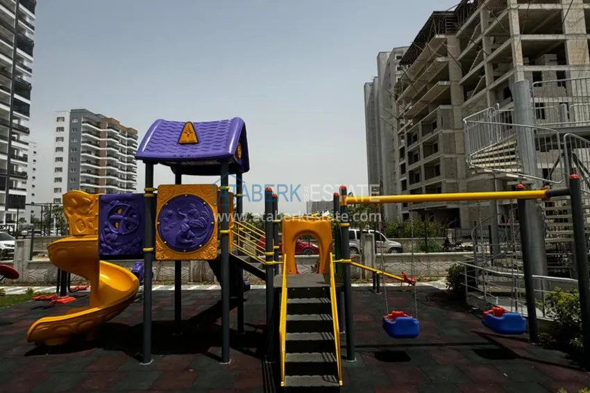 One bedroom apartment with separate kitchen and side sea view in Mersin, Tomyuk district 10
