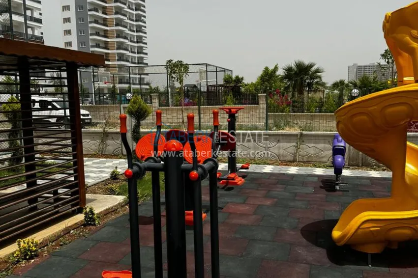 One bedroom apartment with separate kitchen and side sea view in Mersin, Tomyuk district 13