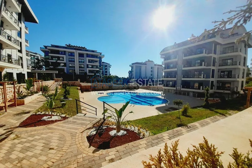 Finished three-room apartment in a new building - Alanya, Oba district 1