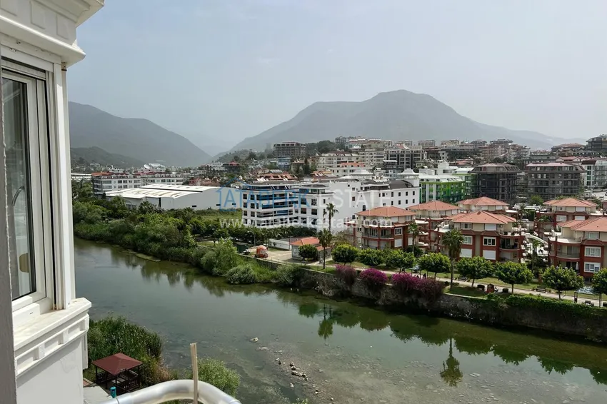 Purchase 3+1 linear apartment with furniture, sea and mountain views on the beachfront - Tosmur, Alanya 23 