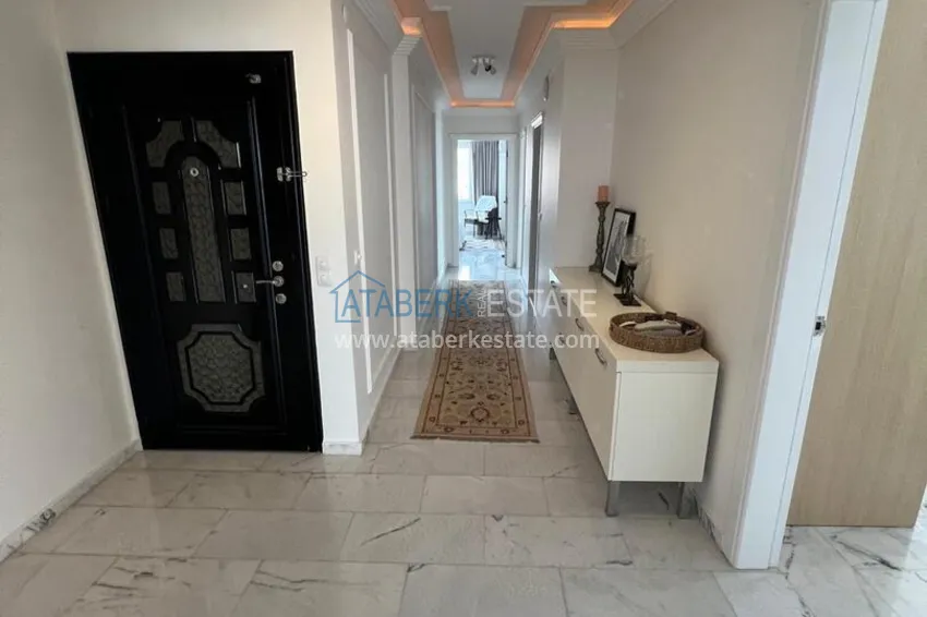 Purchase 3+1 linear apartment with furniture, sea and mountain views on the beachfront - Tosmur, Alanya 2 