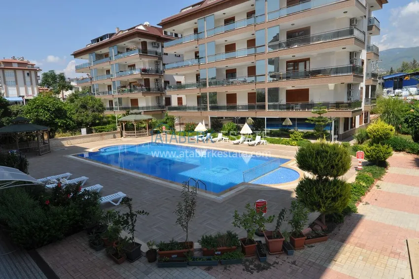 Duplex apartment with furniture, separate kitchen and mountain view — Kestel district, Alanya 1