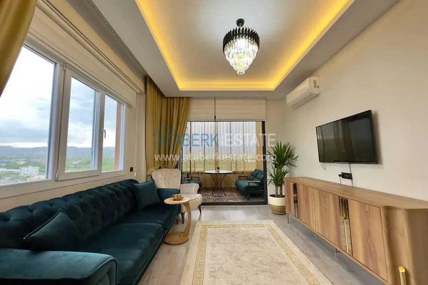 Purchase Turnkey two-bedroom apartment with sea view in Mersin - Tomyuk 11 