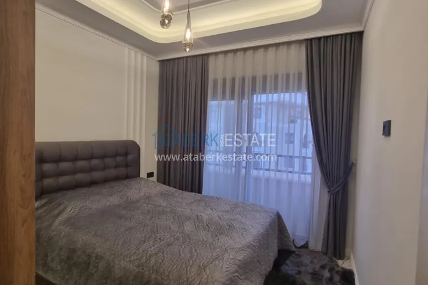 Purchase Furnished three-room apartment in a prestigious area of Alanya, Oba 11 