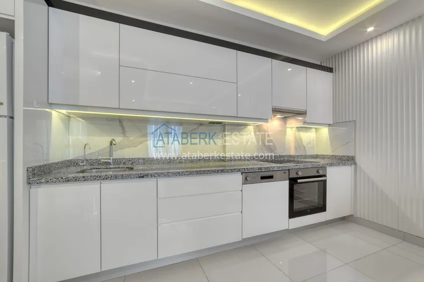 Kupuj Apartament pod klucz z dwiema sypialniami w Mahmutlar w nowoczesnym kompleksie 10