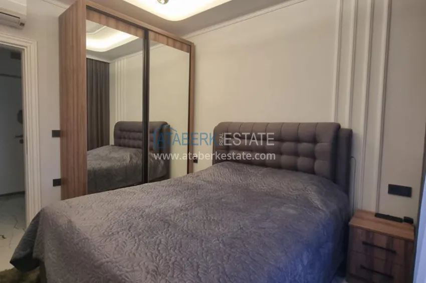 Purchase Furnished three-room apartment in a prestigious area of Alanya, Oba 12 