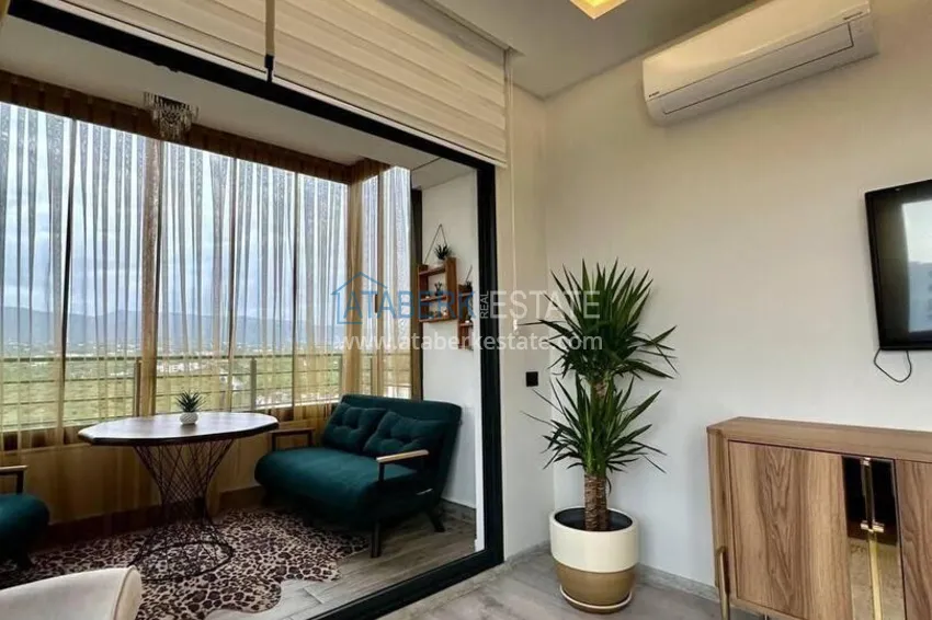 Purchase Turnkey two-bedroom apartment with sea view in Mersin - Tomyuk 12 