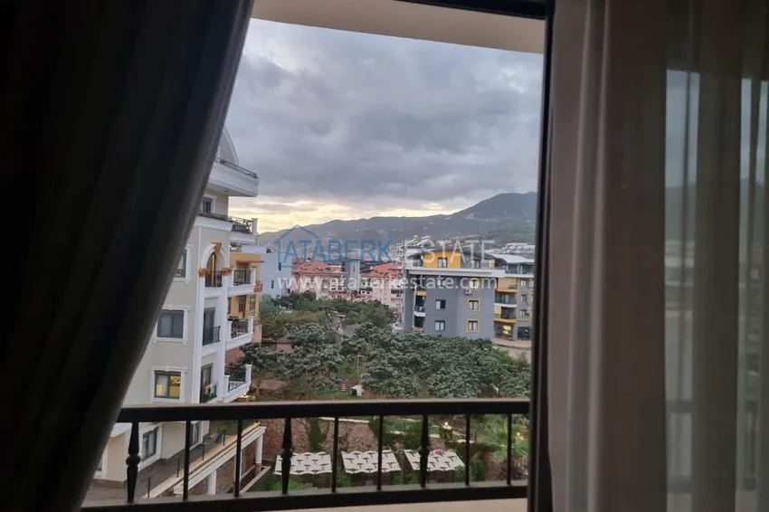 Purchase Furnished three-room apartment in a prestigious area of Alanya, Oba 13 