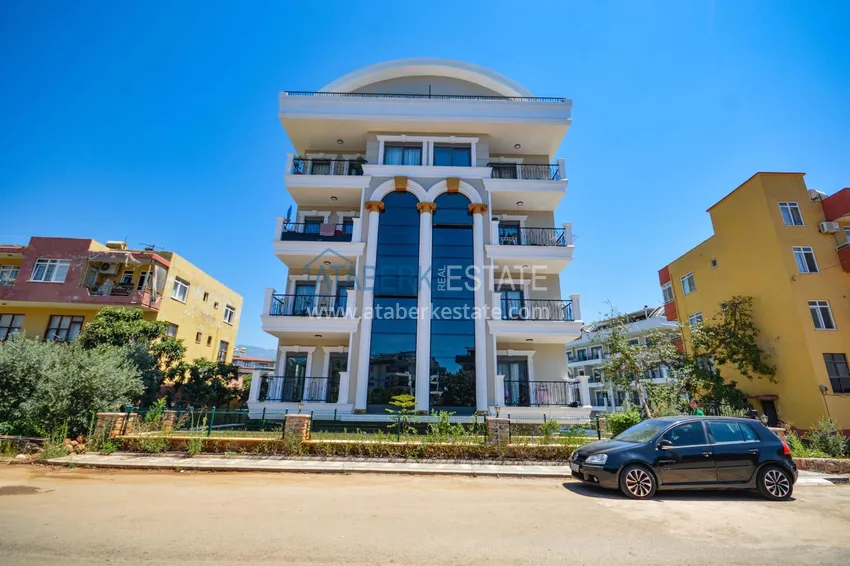 Furnished three-room apartment in a prestigious area of Alanya, Oba 12 