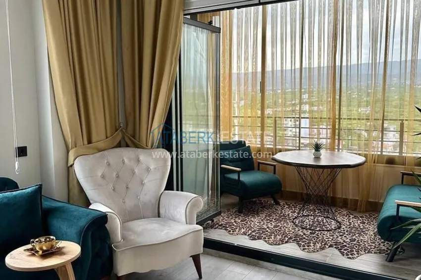 Purchase Turnkey two-bedroom apartment with sea view in Mersin - Tomyuk 13 
