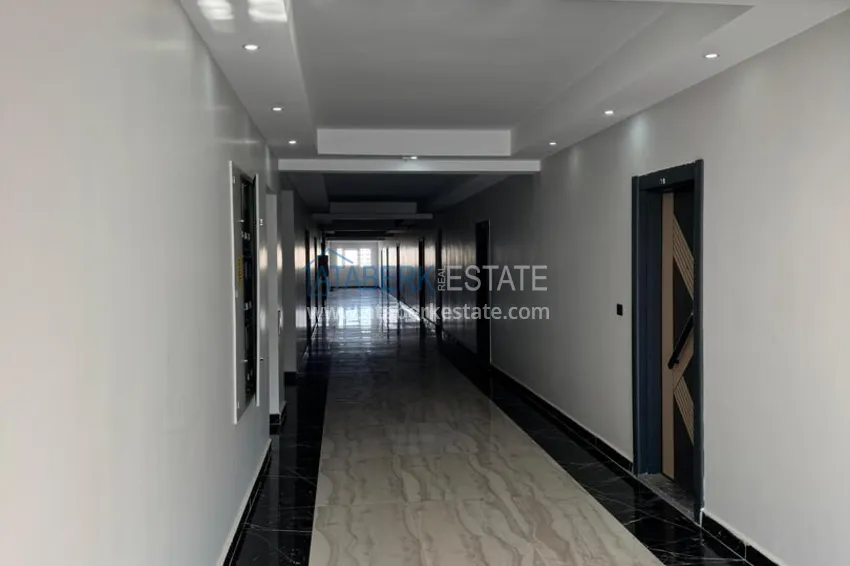 Turnkey two-bedroom apartment with sea view in Mersin - Tomyuk 13 