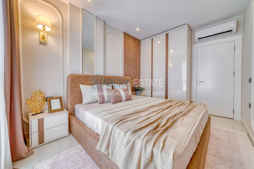 Kupuj Apartament pod klucz z dwiema sypialniami w Mahmutlar w nowoczesnym kompleksie 13