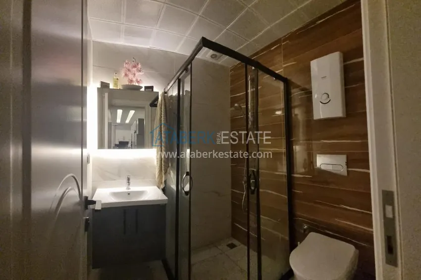 Purchase Furnished three-room apartment in a prestigious area of Alanya, Oba 15 