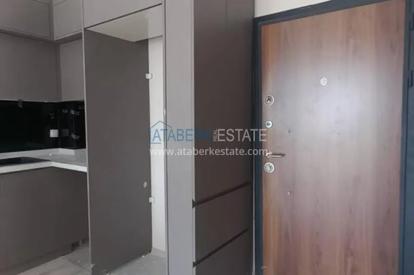 Kupuj Nowy apartament z jedną sypialnią z widokiem na morze w Tomyuk, Mersin 1