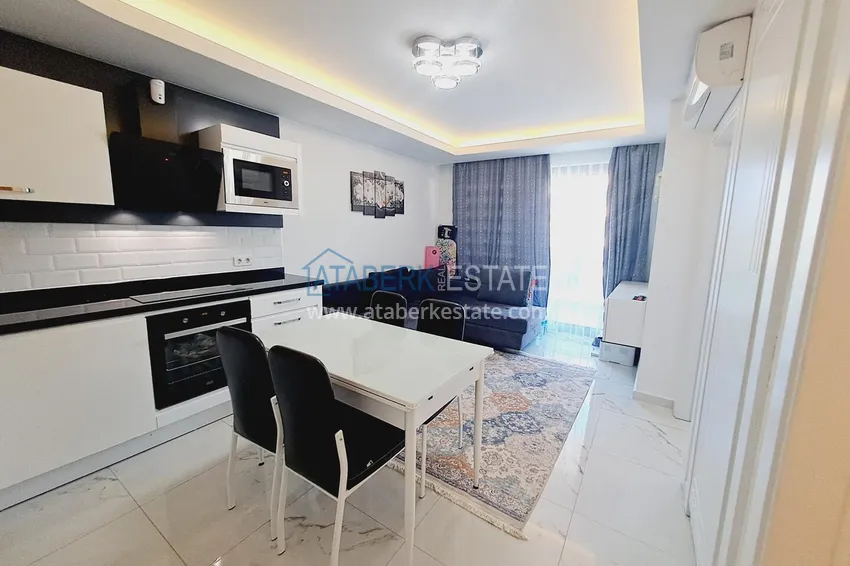 Purchase One bedroom apartment in the center of Alanya with furniture and access to a private beach 1 